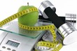 Beschreibung: apfel auf waage mit hanteln